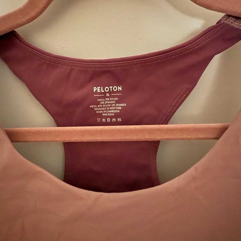 Peloton Cadent V-Back Bra in a mauve/pink color with a maroon inner lining - Picture 2 of 5